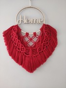 Łapacz z napisem HOME 