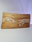 Płaskorzeźba „Stworzenie Adama”. 