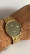 Tissot Stylist z oryginalną zintegrowaną bransoletą w kolorze złotym