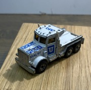 samochodzik zabawkowy matchbox peterbilt 1981 macau 1-60 police dial 911