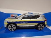 Bburago Volvo EX40 policja, skala 1:43