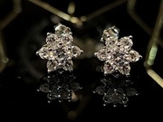 Srebrne kolczyki gwiazdki z cyrkoniami pozłacane