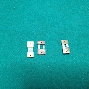 Trzy sprężynki rozbiórkowe do mechanizmu zegara wiszącego