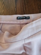 Spodnie eleganckie Pudrowy róż 36 Stradivarius 