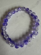 Bransoletka szklana 8 mm – fioletowo-transparentna