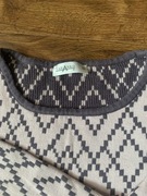 Bawełniany sweter o wydłużonym kroju z kieszonkami róż 36/38 Taranko