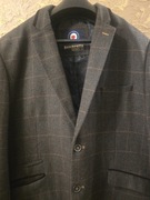 Elegancka angielska marynarka myśliwska w kratę na Hubertus polowanie. L