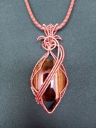 TYGRYSIE OKO DUŻY KAMIEN NATURALNY W OPLOCIE MIEDZIANYM