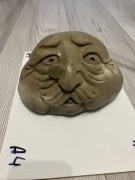 rzeźba ogrodowa twarz betonowa jak kamienna rzadka