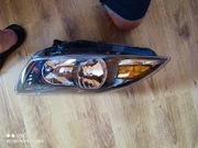 Reflektor lewy przód