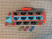 HOT WHEELS LAWETA TRANSPORTER TOR WYŚCIGOWY 3 AUTA