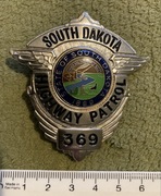 Odznaka policyjna South Dakota Police z numerem służbowym