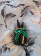 Nieduża świeczka w świątecznym stylu 65g jakieś 10cm 