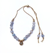 Bransoletka akwamaryn złote dodatki minerały błękit jedwabna nić regulowana