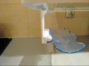 Uchwyt na butelkę, wyposażenie lodówki Ariston