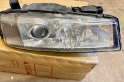 Lampy przód Opel Calibra lewa + prawa Hella oryginał 