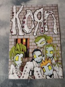 plakat zespołu muzycznego korn