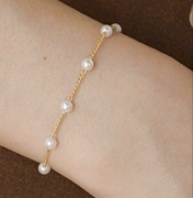 Bransoletka w kolorze złota z perełkami nowa