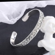 Srebrna sztywna bransoleta motyw fali