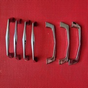 Stare uchwyty meblowe do mebli PRL 7 szt Srebrne PRL