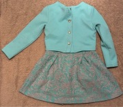 Zielona dziecięca sukienka z wszytym żakietem