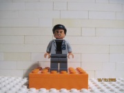 LegoFigurka Jurassic World używana - Dr Henry Wu. Stan prawie nowy