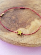 Bransoletka minimalistyczna gwiazdka z gwiazdą