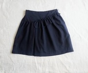 Minimi granatowa spódniczka z falbanką r. 128