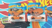 2 Hot Wheels Tesla roadster then and now pomarańczowy MATTEL 2023