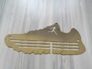 Wieszak na medale dla biegacza, w kształcie buta. Stal nierdzewna. Nowy.