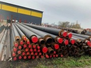 Rury preizolowane, kolana, różne wielkości.