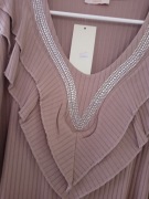 Piękna sukienka z kieszeniami