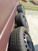 Koła zimowe felgi alufelgi Mitsubishi Colt kołpaki 15cali 4x114,3 67,1mm