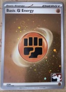 Basic Fighting Energy COSMOS HOLO ze stampem Play! Pokemon (Prize Pack)