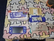 Nintendo Switch Lite + 2 gry