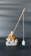 Figurka ceramiczna rybaka
