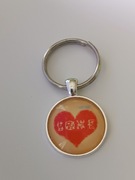 Brelok , breloczek , wypukłe szkło..