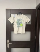 T-shirt chłopięcy beżowy z nadrukiem nowy rozmiar 134