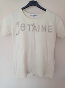 Kremowa bluzka z napisem