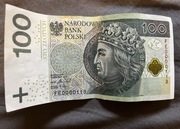 Banknot 100 zł niski numer FE0000113