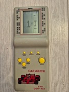 Gra gierka elektroniczna klocki car bricks lata 90 PRL konsola 9 in 1 