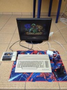 Commodore C64 komplet, gry, joystick QuickShot, tapecart, magnetofon.