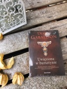 „Uwięziona w bursztynie” D. Gabaldon-nowa, w folii