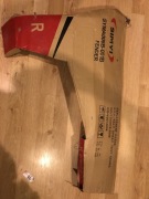 Błotnik prawy przód Mazda 323 2002-2003r