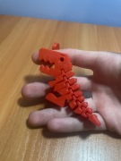 Czerwony dinozaur z serduszkiem