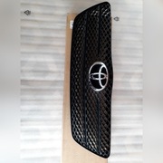 Toyota Corolla E12  Oryginalna atrapa Nowa