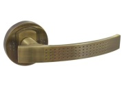 Klamka pokojowa Ambition Argo Mosiądz Patyna, szyld okrągły