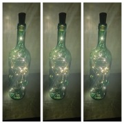 Butelka butla lampki lampka dekoracja święta nastrojowy prezent wino zieleń