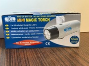 Latarka dynamo TCL Mini Magic Torch – bez baterii, na korbkę, LED NOWA