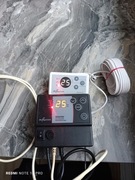 Elektroniczny miarkownik ciągu marki Unister+panel sterujący pokojowy